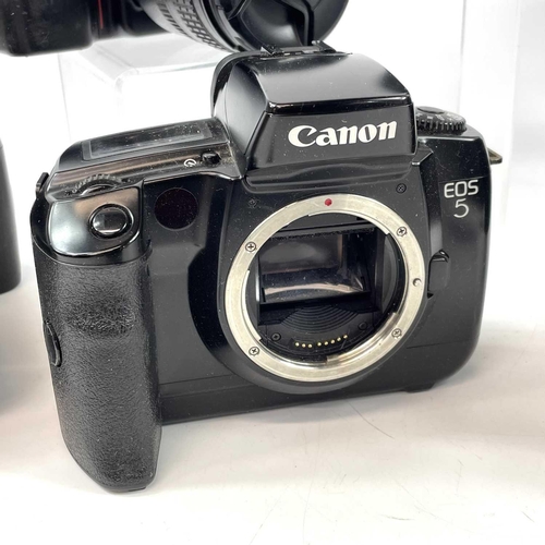 148 - A Canon EOS 1000F SLR camera serial number 3336289 fitted with Canon Zoom Lens EF 35-80mm lens toget... 