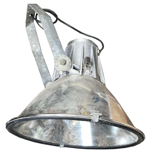 153 - A large Philips industrial light fitting, diameter 58cm.