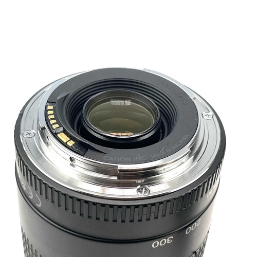 156 - A Canon Zoom EF 75-300mm 1:4-5.6 III USM serial number 45108830 together with a Sigma Zoom 28-135mm ... 