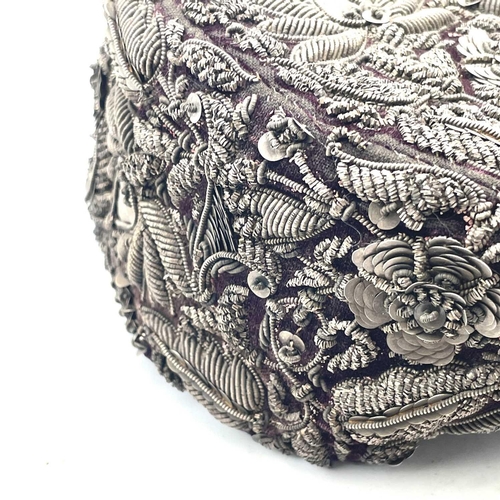 1606 - A circa 1900 Indian possibly Hyperbad topi elaborately decorated in silver thread on velvet ground d... 