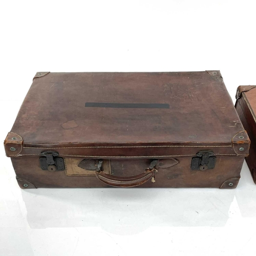 1609 - A chesnut leather suitcase 66x35x18cm, together with another similar suitcase (2).