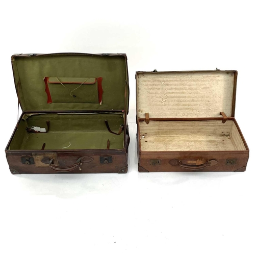 1609 - A chesnut leather suitcase 66x35x18cm, together with another similar suitcase (2).