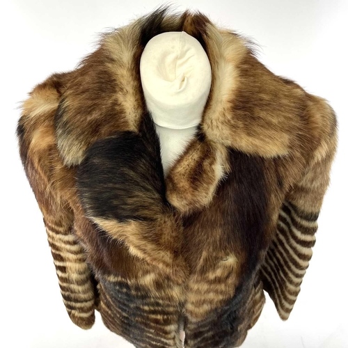 1613 - A Candian wolf fur coat size 38.