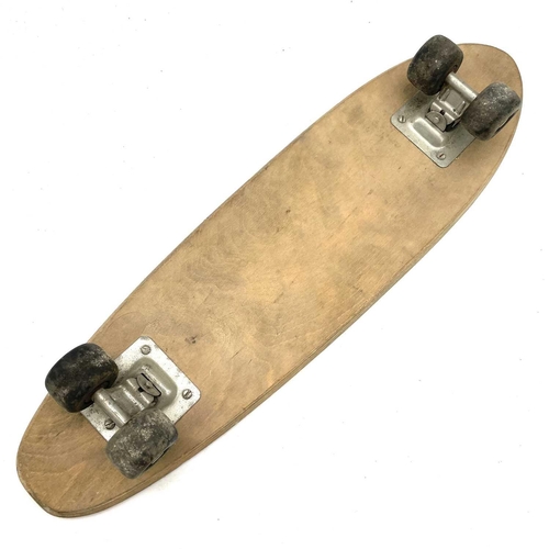 162 - A circa 1960s bullet Warwick Surf Skate skateboard, length 59cm.