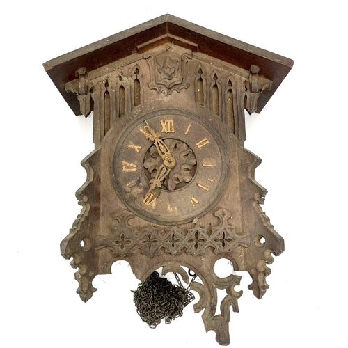 1702 - A Swiss Black Forest oak cuckoo wall clock, circa 1920, with Gothic pierced and applied tracery, hei... 