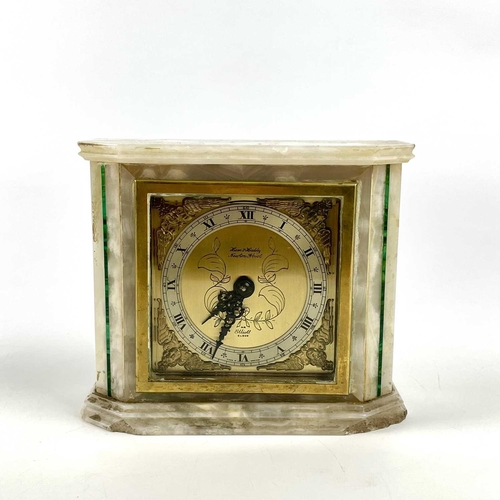 1710 - An Elliott mantel timepiece, circa 1930s, contained in a malachite inlaid white marble case and with... 