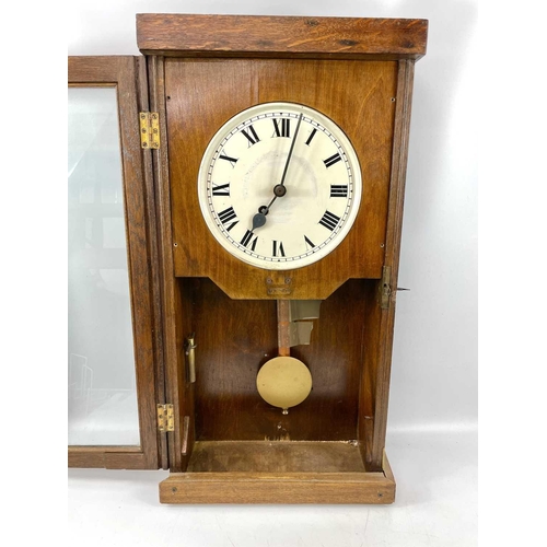 1711 - A Gledhill-Brook oak case glazed time recorder wall clock, fitted with a fusee movement, incomplete ... 