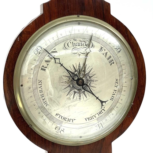 1718 - A Victorian rosewood wheel barometer, with silvered dial and incorporating a thermometer, convex mir... 