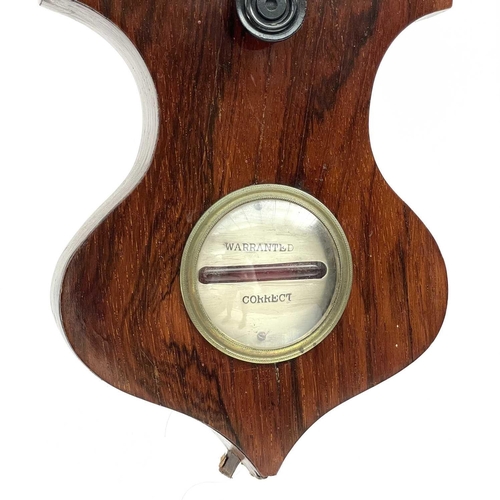 1718 - A Victorian rosewood wheel barometer, with silvered dial and incorporating a thermometer, convex mir... 