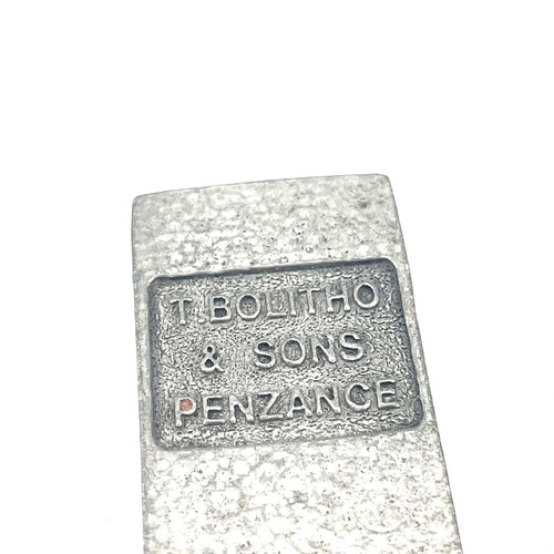 175 - Two miniture T. Bolitho & Sons Penzance copy tin ingots by St Justin, the largest 9 x 2.5cm.