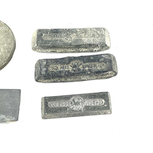 176 - A rare selection of five Tolgus miniature tin ingots made by Richard Williams and also a copy of a C... 