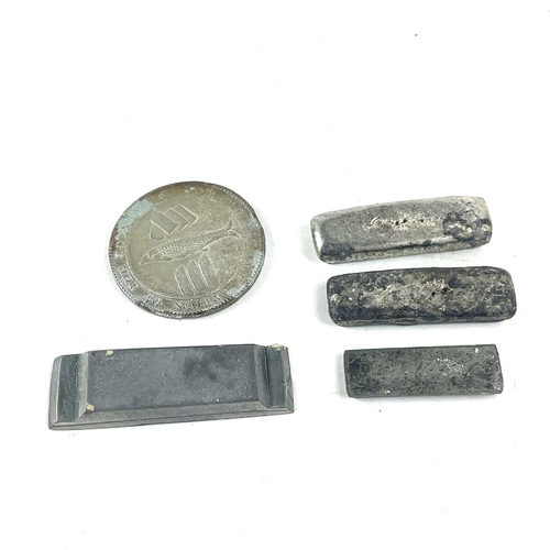 176 - A rare selection of five Tolgus miniature tin ingots made by Richard Williams and also a copy of a C... 