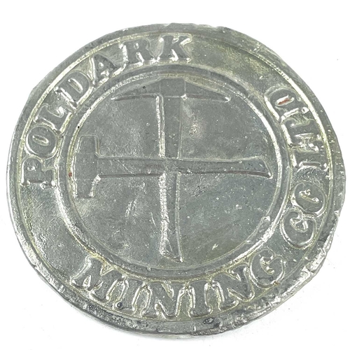 178 - A Poldark Mining Co Ltd circular ingot, diameter 8.5cm..