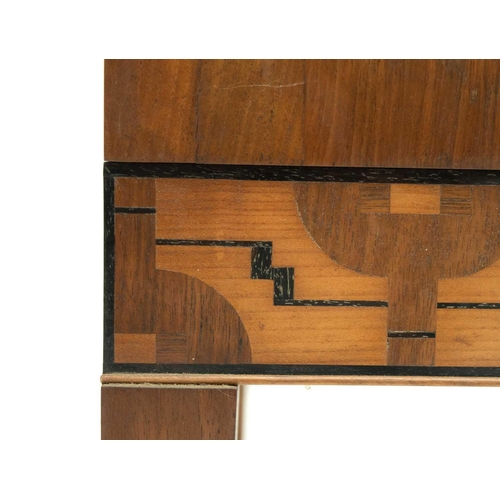 1800 - An Art Deco walnut and inlaid secretaire chest by Judith E. Hughes, of small proportions, the upper ... 