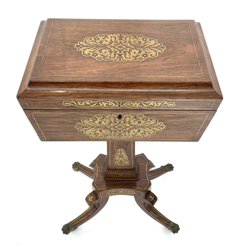 1801 - A Regency rosewood and brass inlaid teapoy, with sarcophagus shaped top enclosing four lidded compar... 