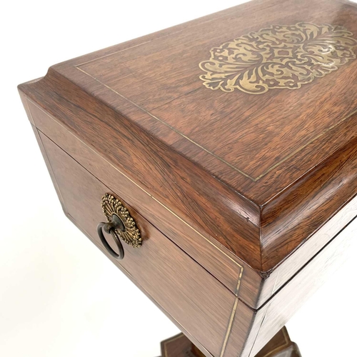 1801 - A Regency rosewood and brass inlaid teapoy, with sarcophagus shaped top enclosing four lidded compar... 