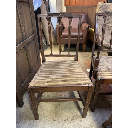 1810 - A set of eight George III mahogany dining chairs, including two carvers, with a triple vertical bar ... 