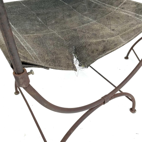 1813 - A pair of wrought Iron 'Bishop's' chairs, mid 20th century, with suede leather backs and slung seats... 