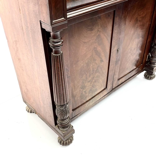 1817 - A William IV mahogany chiffonier, the raised back fitted two shelves above a long frieze drawer and ... 