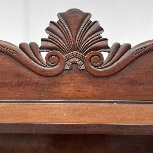 1817 - A William IV mahogany chiffonier, the raised back fitted two shelves above a long frieze drawer and ... 