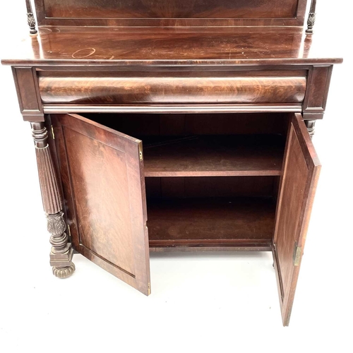 1817 - A William IV mahogany chiffonier, the raised back fitted two shelves above a long frieze drawer and ... 