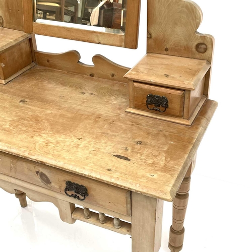 1819 - An Edwardian pine dressing table, fitted with a swing mirror and three drawers on turned legs, heigh... 