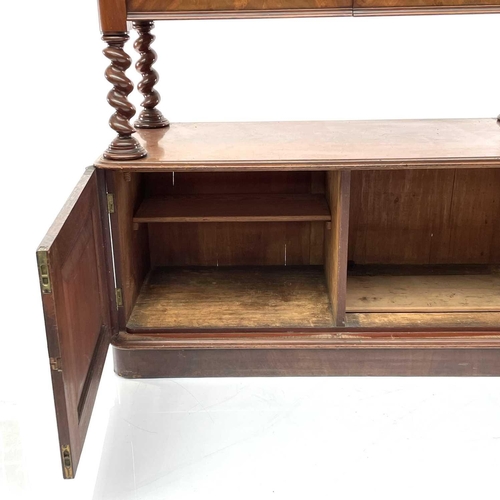 1821 - A Victorian mahogany two tier buffet, with raised back above two drawers, with twist supports and tw... 