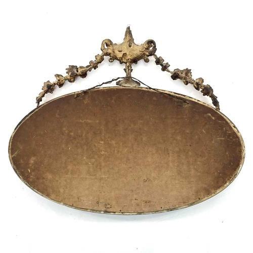 1823 - An Edwardian gilt framed oval wall mirror, of Neo-Classical form, with urn and festoon cresting, hei... 