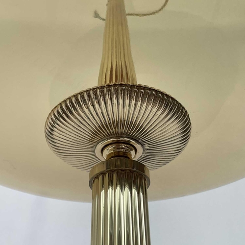 1839 - A modern gilt metal standard uplighter, with dome top and reeded column, height 162cm.