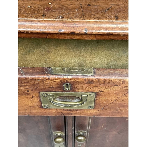 1848 - A Victorian mahogany two-part cabinet, of small proportions, the upper part with two glazed doors, t... 