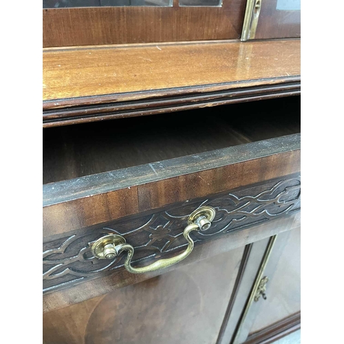 1849 - A late Victorian mahogany cabinet bookcase, in the Georgian taste, with a glazed upper part and a lo... 