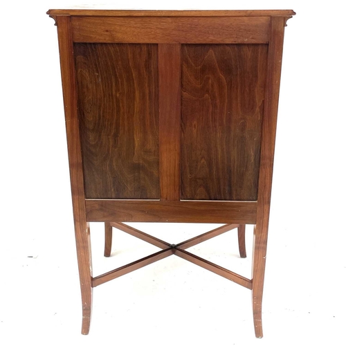 1850 - An Edwardian walnut music cabinet, slightly bow front and fitted with five drop-front drawers on spl... 