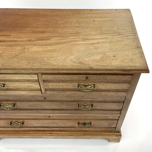 1856 - An Edwardian walnut chest of two short and two long drawers, on bracket feet, formerly a dressing ch... 