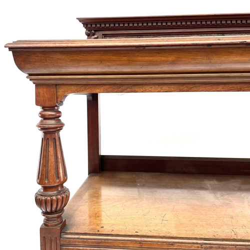 1860 - A late Victorian walnut buffet, with carved raised back and two carved doors below, height 125cm, wi... 