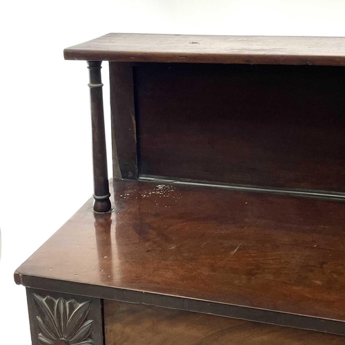 1867 - An early Victorian mahogany chiffonier, with raised back above a long drawer and two doors flanked b... 