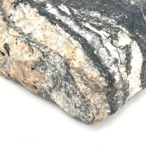 187 - A massive cassiterite from South Crofty Mine Redruth, length 15cm.