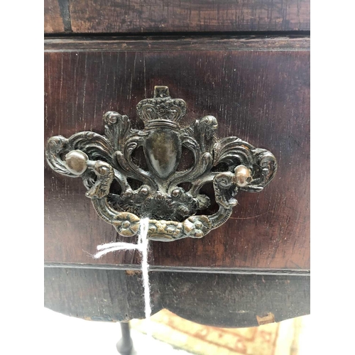 1873 - An early 18th century mahogany side table, the rectangular top with shaped edge above a long drawer ... 