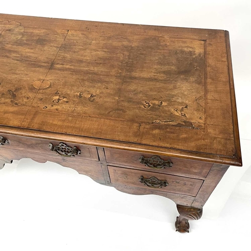 1881 - A Queen Anne style Walnut kneehole side table, late 19th century, fitted with 5 drawers around a sha... 