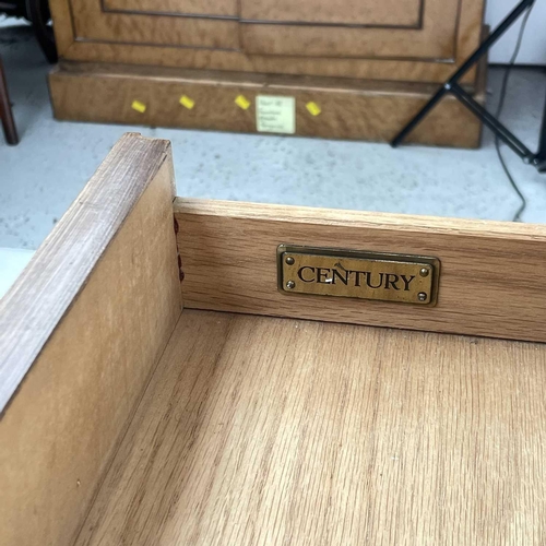 1884 - A Biedermeier style walnut chest of three long drawers, 20th century, with brass capped half column ... 