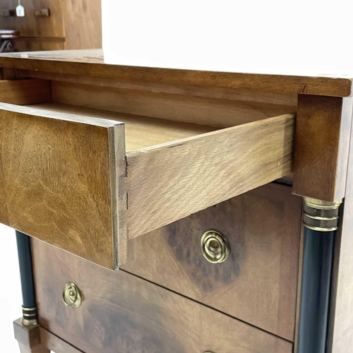 1884 - A Biedermeier style walnut chest of three long drawers, 20th century, with brass capped half column ... 