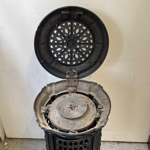 1900 - A French Bodin & Cie cast iron stove, circa 1920, height 87cm.