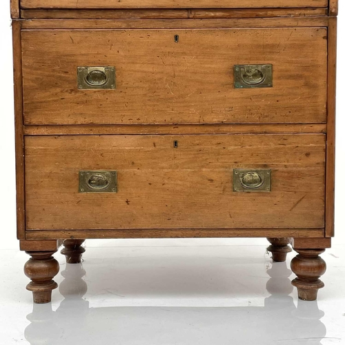 1902 - An early Victorian teak two-part campaign chest, with two short and three long drawers with recessed... 