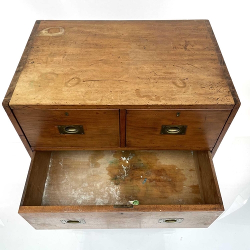 1902 - An early Victorian teak two-part campaign chest, with two short and three long drawers with recessed... 