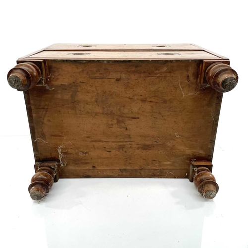 1902 - An early Victorian teak two-part campaign chest, with two short and three long drawers with recessed... 