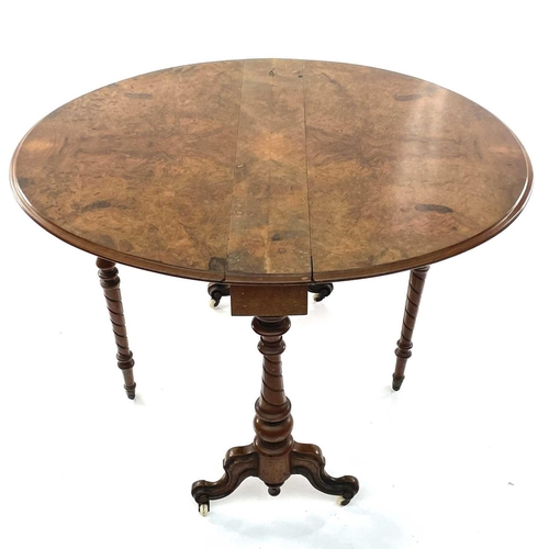 1904 - A Victorian burr walnut Sutherland table, raised on spiral turned supports with moulded legs and whi... 