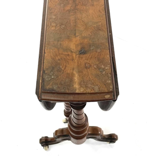 1904 - A Victorian burr walnut Sutherland table, raised on spiral turned supports with moulded legs and whi... 