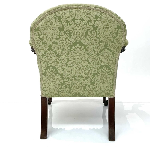 1910 - A George III mahogany Gainsborough type open armchair, the padded arms with prominent moulded outswe... 