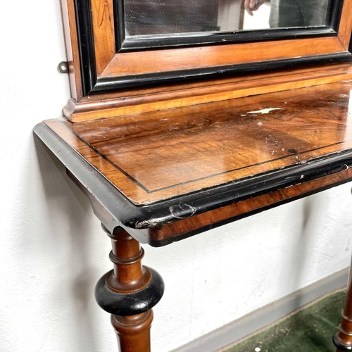 1911 - A figured walnut console table with a matched pier mirror, late 19th century, with ebonised decorati... 