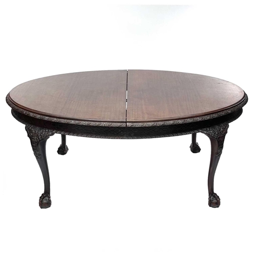 1920 - A late Victorian mahogany oval extending dining table, with one extra leaf, with a carved and gadroo... 