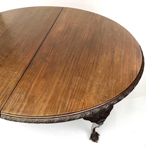 1920 - A late Victorian mahogany oval extending dining table, with one extra leaf, with a carved and gadroo... 